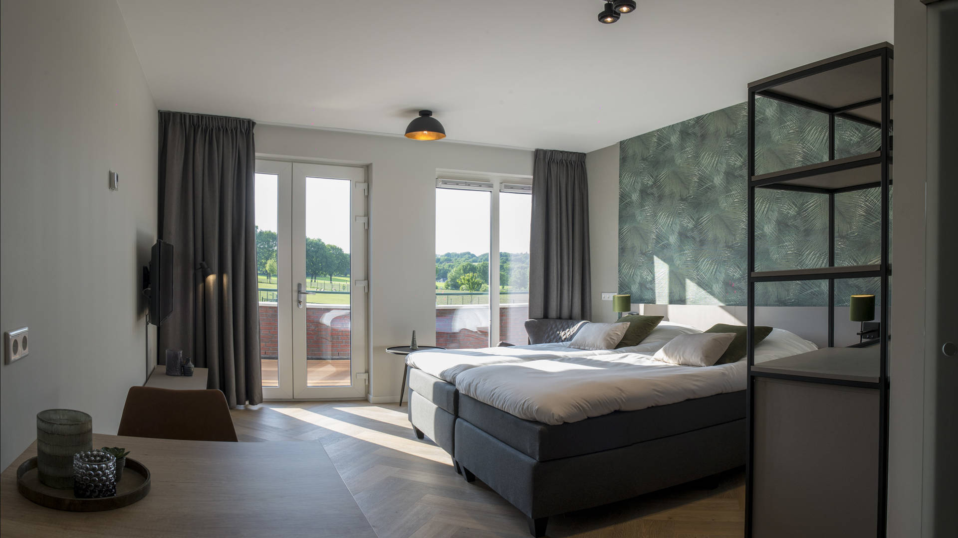 Afbeelding voorSlaap in ruime kamers met gescheiden bedden.